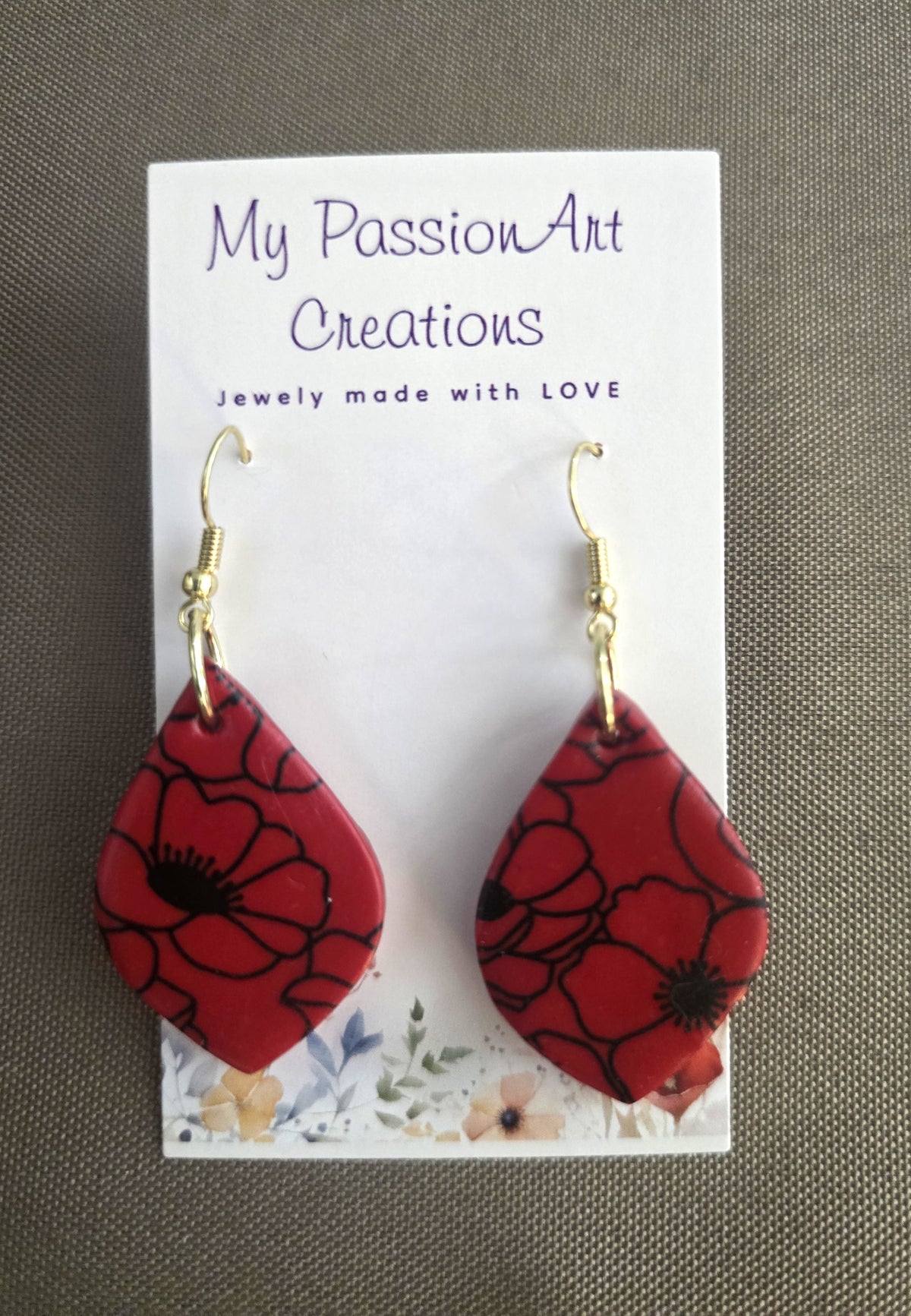 Red Elongated Diamond Earrings with Black Poppy Design